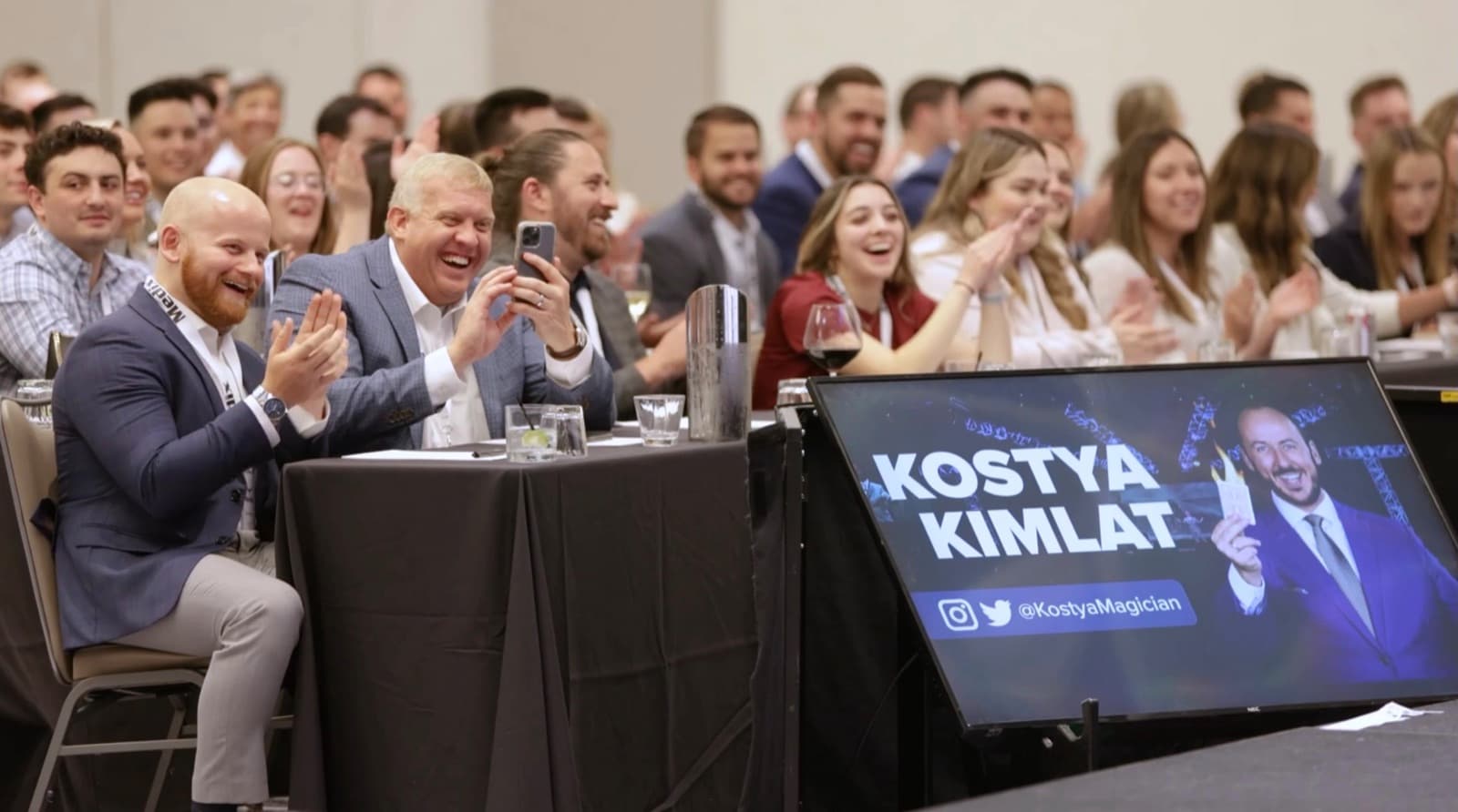 Audience reacting to mentalist performance